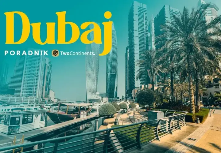 Dubaj: czy do Dubaju trzeba paszport? Widok na nowoczesne drapacze chmur, palmy i łodzie w marinie.